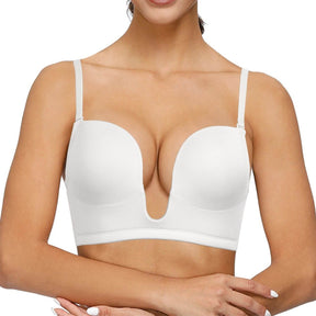 woman with white low cut push up plunge back bra
